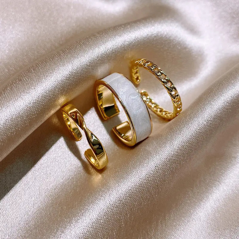 Set of Gold Rings with White Enamel and Chain