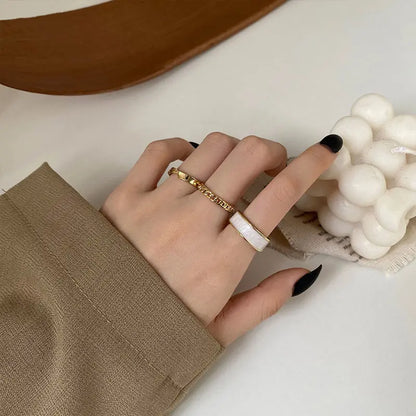 Set of Gold Rings with White Enamel and Chain